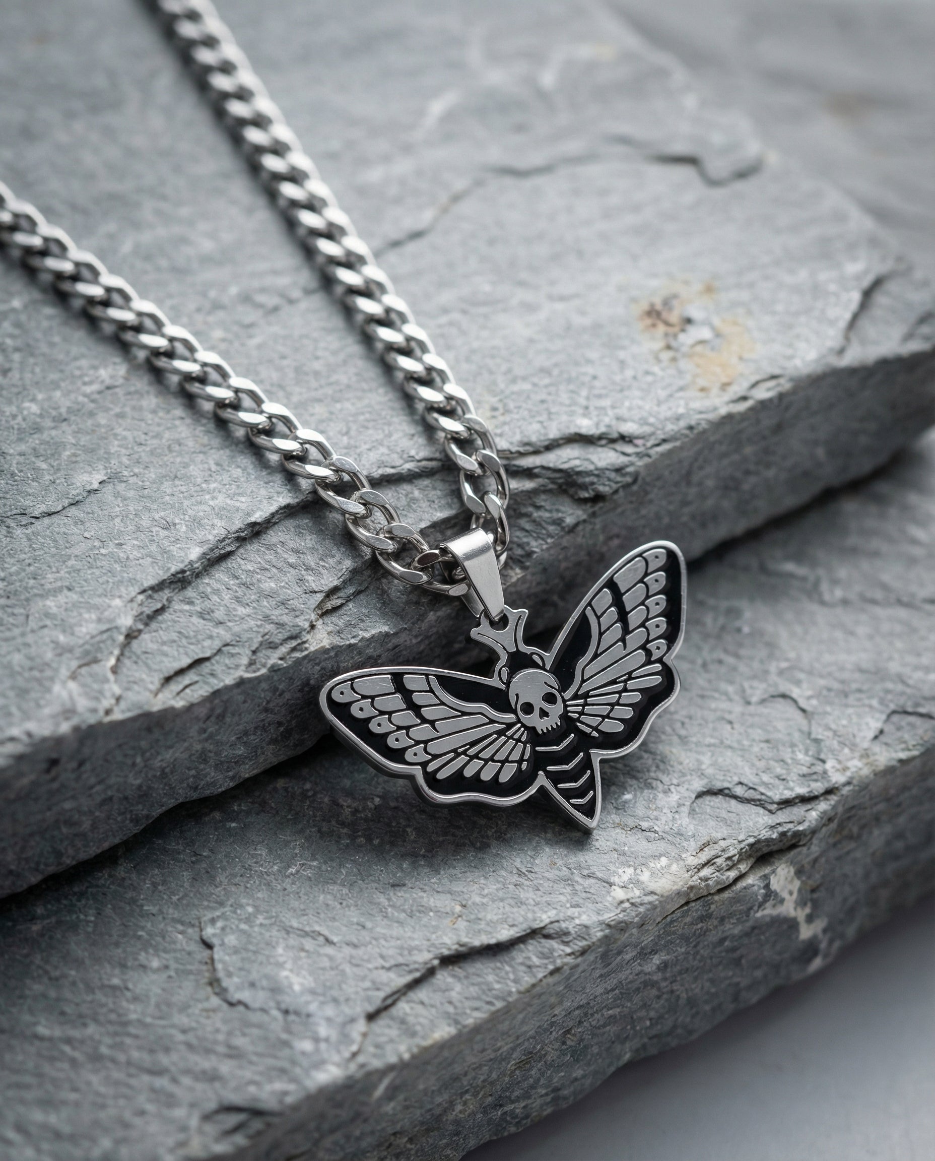 Butterfly skull necklace